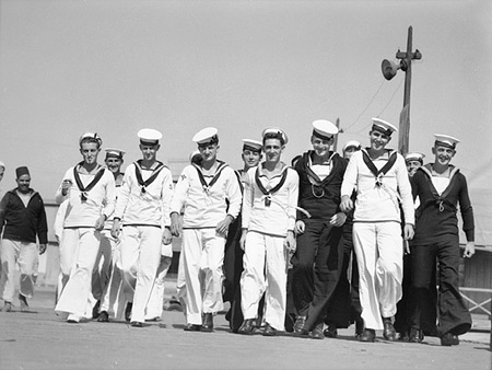 22nd Jul 1940. HMAS Sydney (II) liberty men come ashore for well deserved leave.  (Photo: AWM 002432)