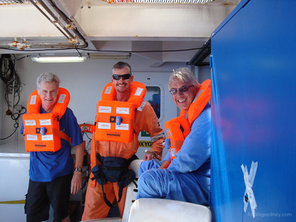 The Electric Pictures documentary crew, Mathew, Chris and Ulle, participating in a fire drill on deck.