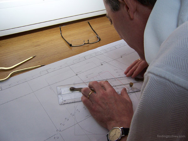 Search Director David Mearns plotting the location of the Sydney wreck on a chart.