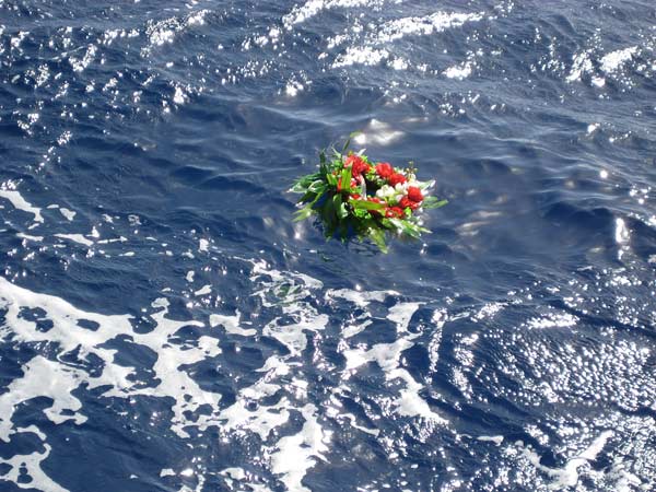 The commemorative wreath floating on the ocean surface above the wreck of HMAS Sydney (II).
