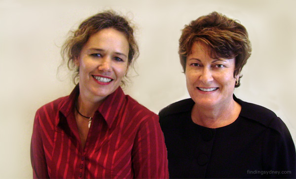 Leeanne Evans and Penny Buchan, the office management team, posing together in an office setting.