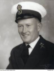 Studio portrait of 21030 Shipwright 3rd Class Robert Beauchamp Hopcraft, RAN, of Sydney, NSW. Hopcraft enlisted on 2 March 1936 and served aboard the HMAS Sydney (II). He was killed in action, aged 27 years, when the HMAS Sydney was sunk in the Indian Ocean on 20 November 1941 while battling with the German Raider HSK Kormoran.