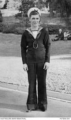 Portrait of S5203 Stoker Third Class (Sto III) Jack Stephen Trenbath, RAN, of Wickham, NSW. Sto III Trenbath's ambition had been to to join the RAN, and he enlisted on 27 February 1941. Sto III Trenbath was killed in action, aged 17, when HMAS Sydney II was sunk in the Indian Ocean by the German auxiliary cruiser Kormoran on 20 November 1941. After Sto III Trenbath's death, his brother N10552 Gunner Keith William Trenbath, 1 Field Regiment, Royal Australian Artillery, transferred to the RAN. Stoker Second Class Keith Trenbath was killed in action when the ship on which he was serving, HMAS Armidale, was attacked and sunk by Japanese aircraft, north west of Darwin, on 1 December 1942. He was aged 21.