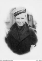Street portrait of S5362 Ordinary Seaman (OS) John Vincent Cole, HMAS Cerberus, of Manly, NSW. OS Cole enlisted in the RAN on 31 March 1941. Whilst serving in HMAS Sydney II, he was killed in action when the Sydney was sunk in the Indian Ocean by the German auxiliary cruiser Kormoran on 20 November 1941. He was aged 19.