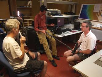 Television crew recording a public announcement by David Mearns