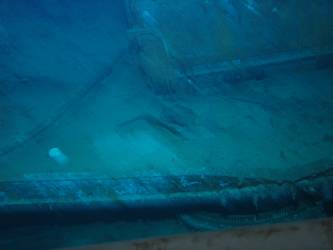 4-inch gun deck. Torpedo mount ring gear visible below