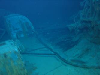 Port side damage to 4-inch gun deck