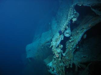Foredeck folded back and over barrels of A turret