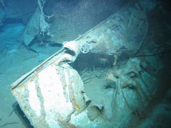 Shell exit hole in mild steel plate. Possibly wreckage from A turret