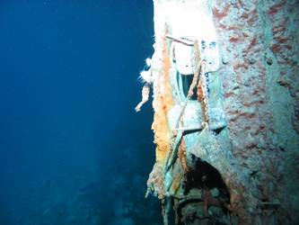 Close-up of foredeck wreckage with fairlead visible