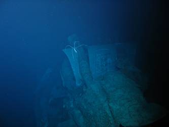 Fore deck folded back over barrels of A turret
