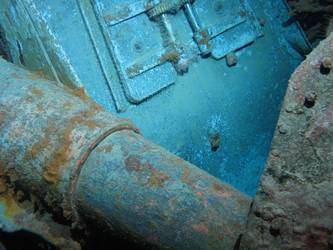 Shell hit beneath A turret sighting ports