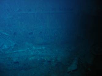 Damage to port side of forward superstructure
