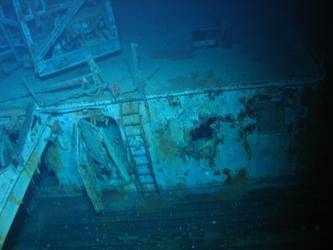 Damage to bakery on port side of ship, crane visible above