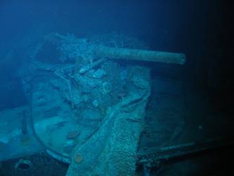 P1 4-inch gun at forward end of gun deck port side
