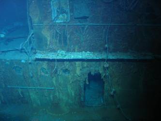 Officers WC's aft end of port side 4-inch gun deck. Burnt