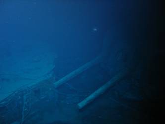 X turret guns trained 45 degrees to port