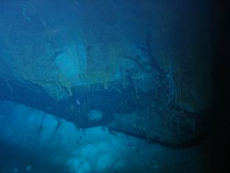 Ship's stern bent and buckled on seabed