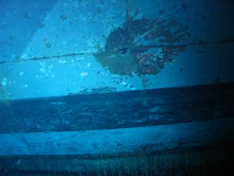 Shell hit on ship's ship side in vicinity of B turret