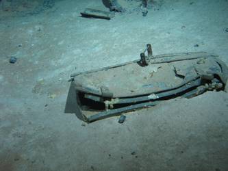 Remnants of leather bag on seabed