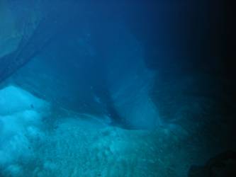 Impact crater on seabed next to ship's stern stbd side