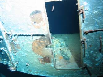 Rear of X turret showing damage and hatch doors open