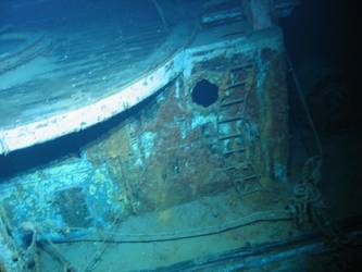 Forward stbd end of 4-inch gun deck above vegetable store