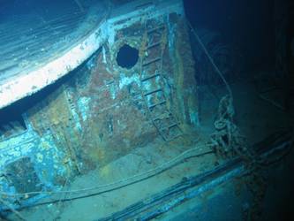Forward stbd end of 4-inch gun deck above vegetable store