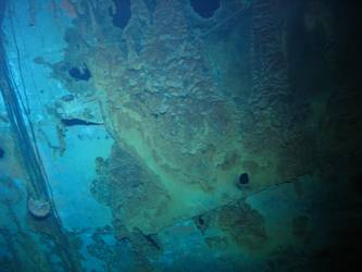 Damage to ship's stbd side in vicinity of ship's galley