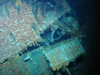 Damage to forward stbd side of bridge superstructure