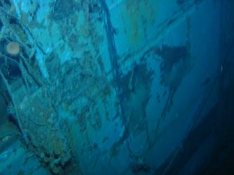Close-up of shell hit on stb side of ship