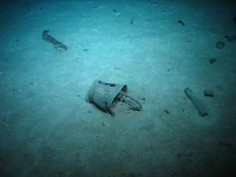 Steel bucket on seabed