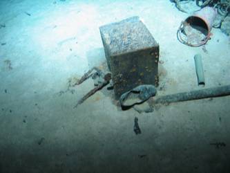 Shoe, steel box, cartridge, red bucket and pipe