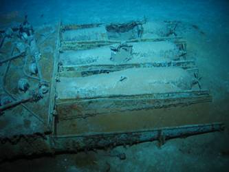 Torpedo tubes with three torpedoes remaining in mount