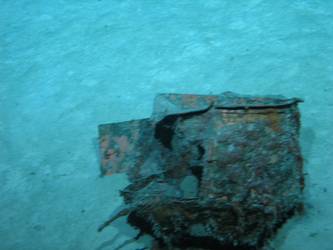 Steel drum or signal light on seabed
