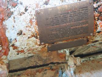 Brass tally plate on side of quadruple torpedo mount